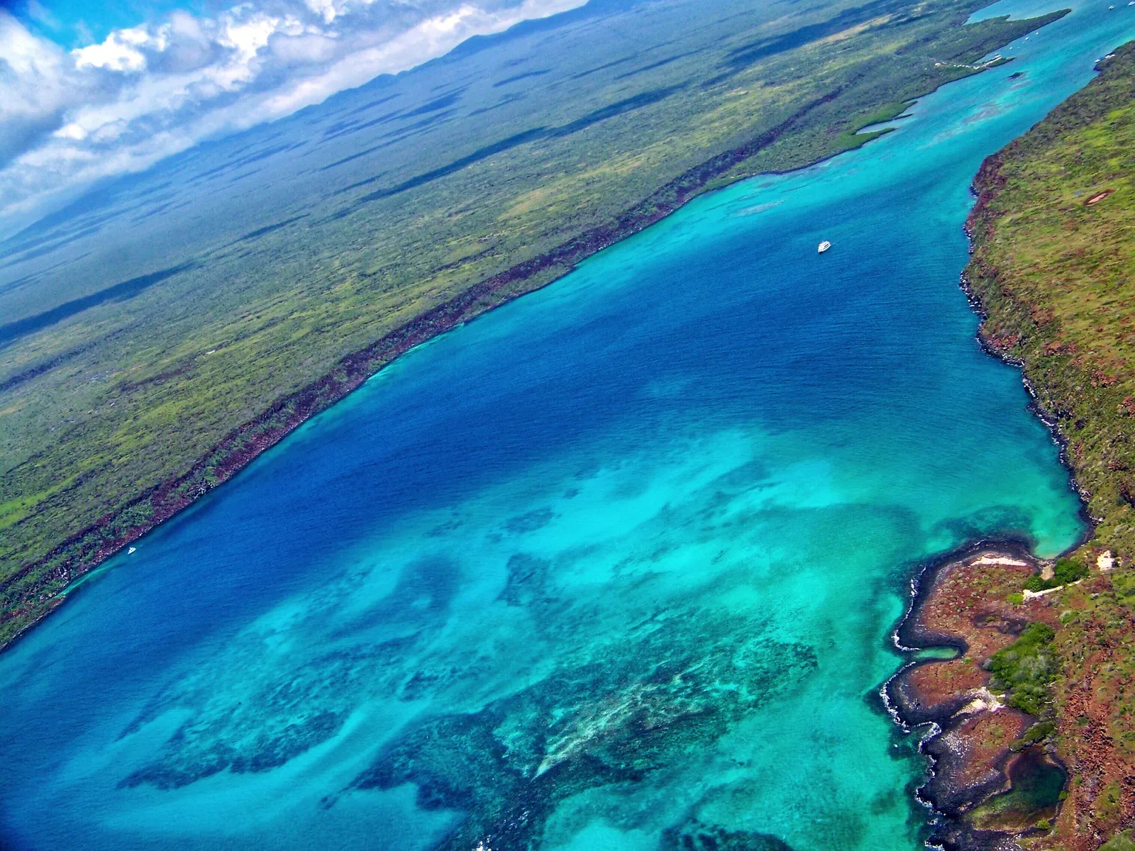 Aerial view of the Galápagos islands, coastline and turquoise water